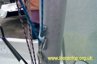 Pass the tail round the hook on the cleat...